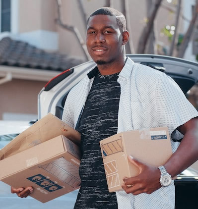 Courier holding parcels